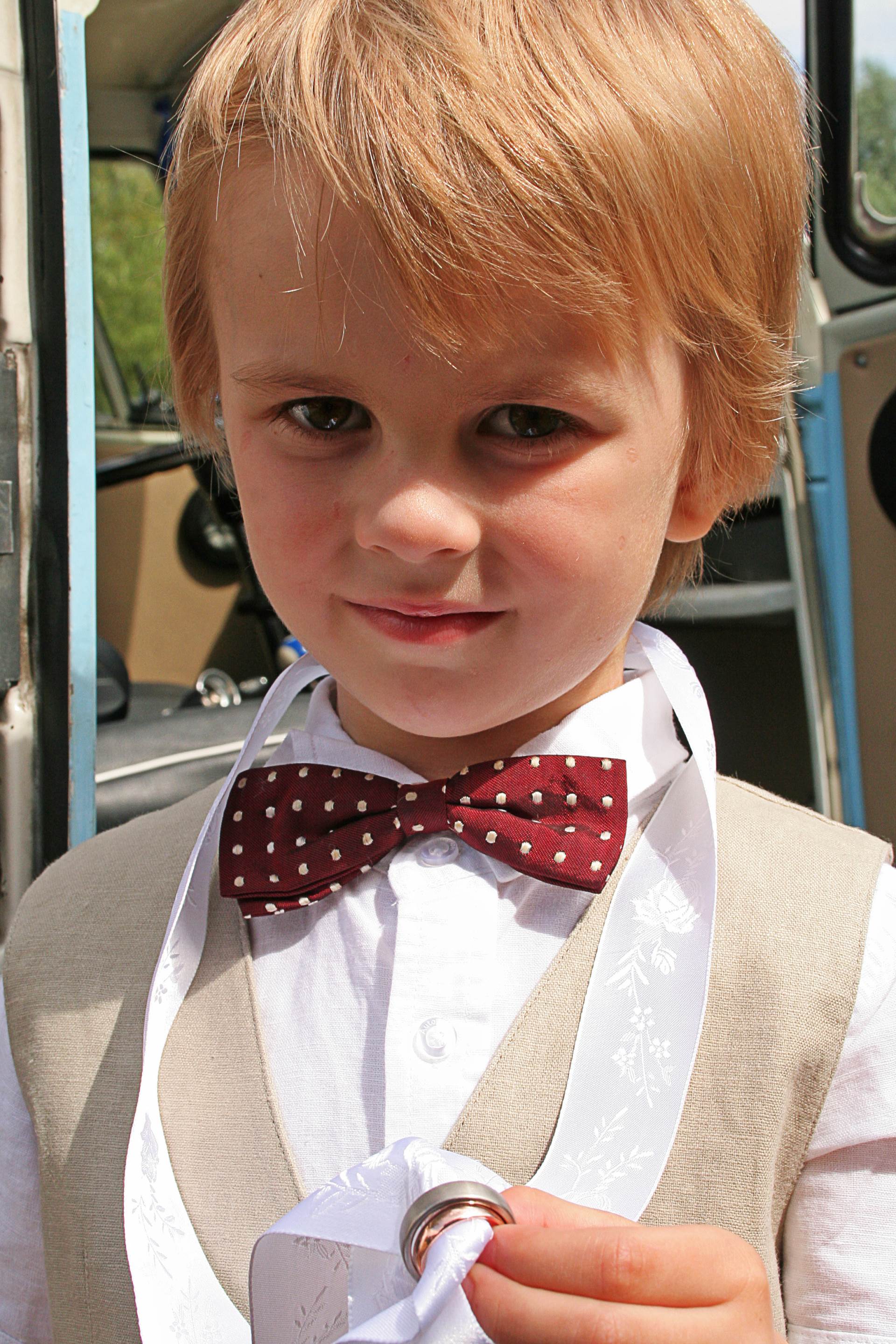 Page boy at a vintage wedding as featured on The National Vintage Wedding Fair blog