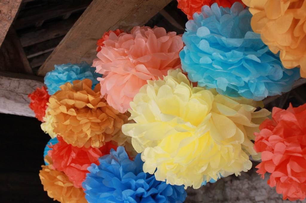 Vintage wedding tissue paper pom pom decorations from the National Vintage Wedding Fair