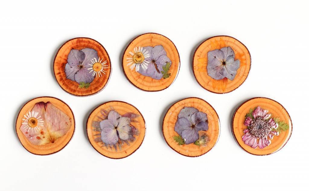 Flowers pressed into coasters as featured on National Vintage Wedding Fair blog