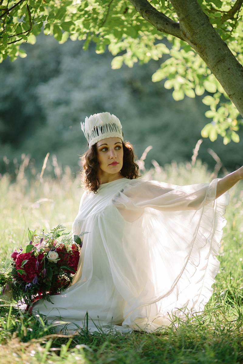 1970s vintage wedding boho bride with feather crown photo by Binky Nixon for the National Vintage Wedding Fair