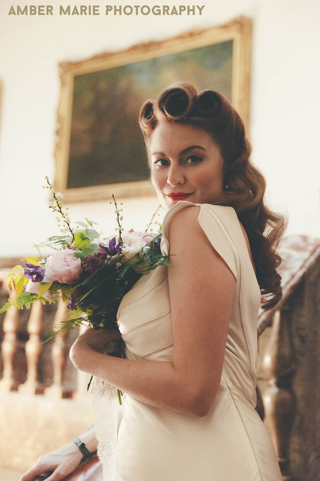 Vintage wedding dresses at the fashion parade photo by Amber Marie Photography at the National Vintage Wedding Fair