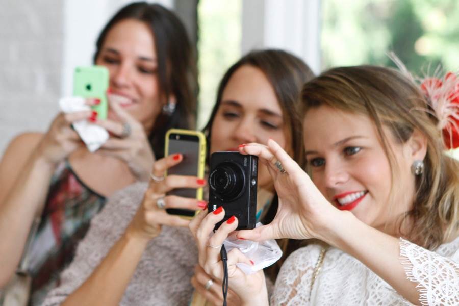 Wedding photography with mobile phones being used by Hazel Buckley as featured on the National Vintage Wedding Fair