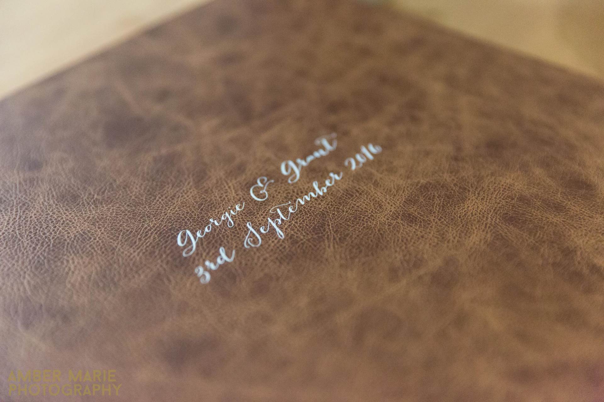 Do you need to order a wedding photo album of your wedding photos by Amber Marie Photography