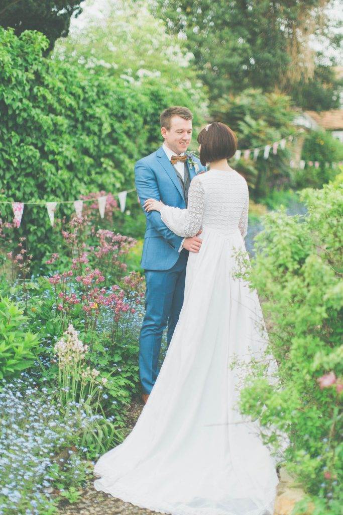 1960s wedding dress and a bride with a bob haircut