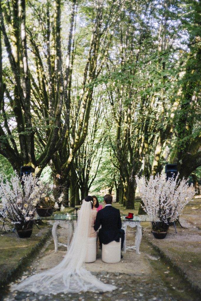 A magical Portuguese wedding with a pink lace dress & silk flowers