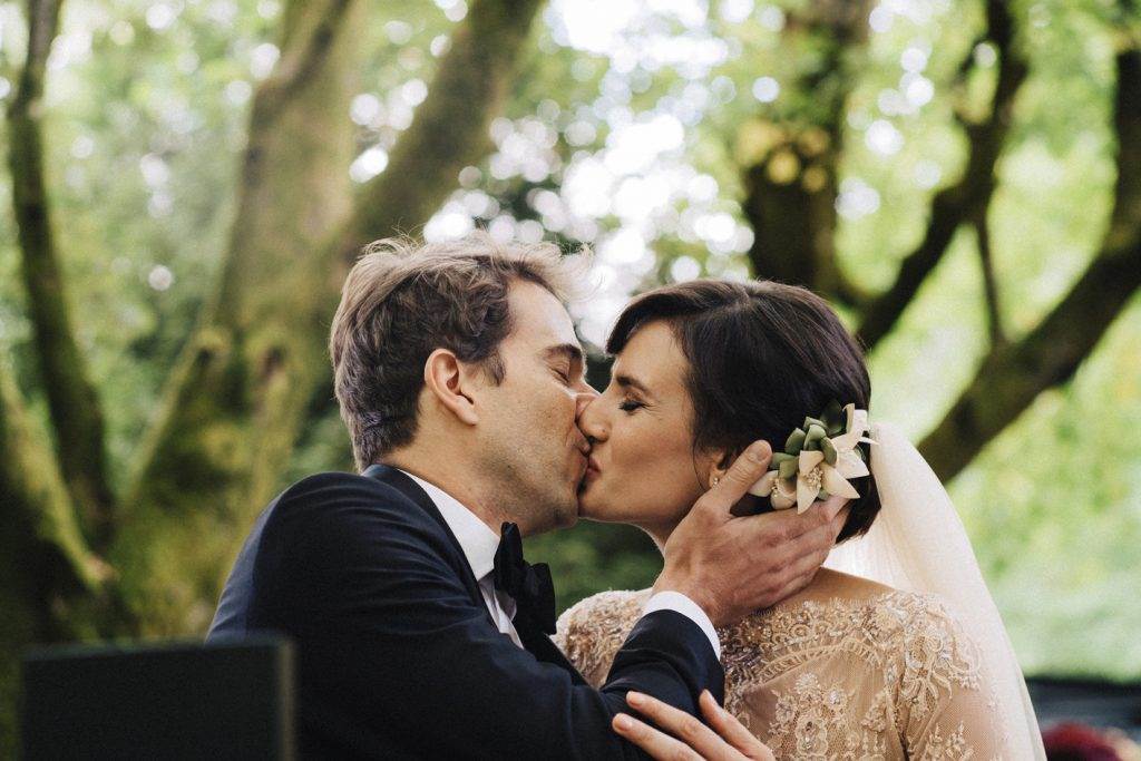 A magical Portuguese wedding with a pink lace dress & silk flowers