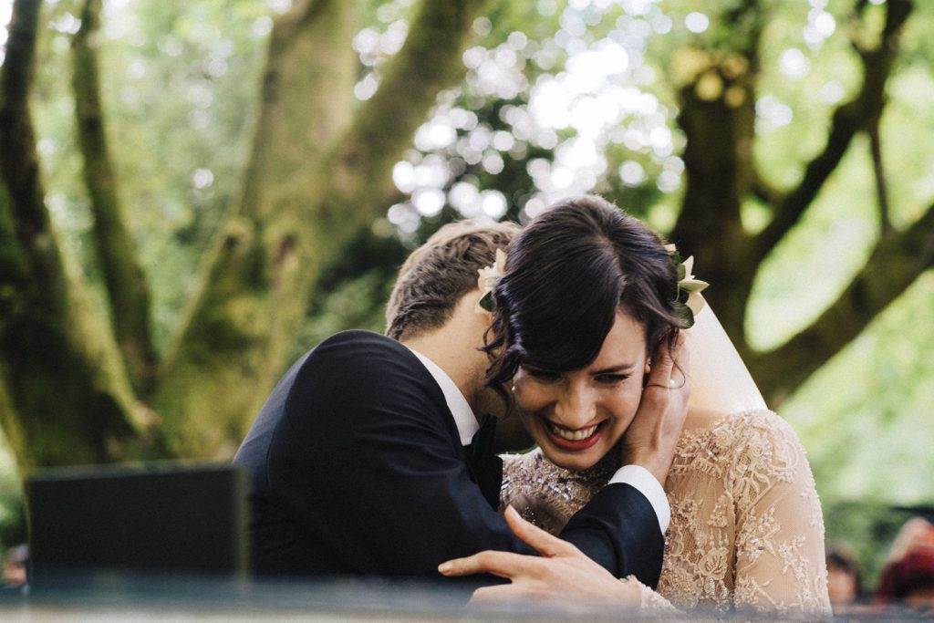 A magical Portuguese wedding with a pink lace dress & silk flowers