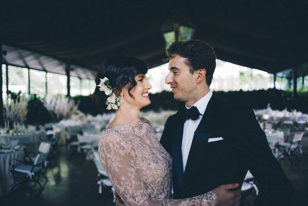 A magical Portuguese wedding with a pink lace dress & silk flowers