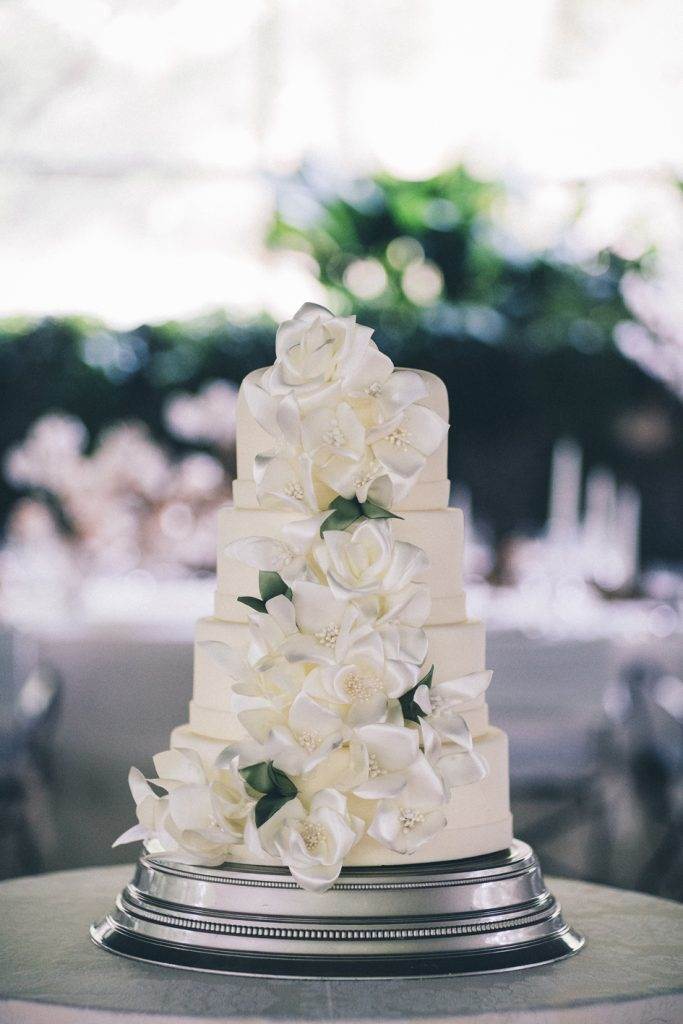 A magical Portuguese wedding with a pink lace dress & silk flowers