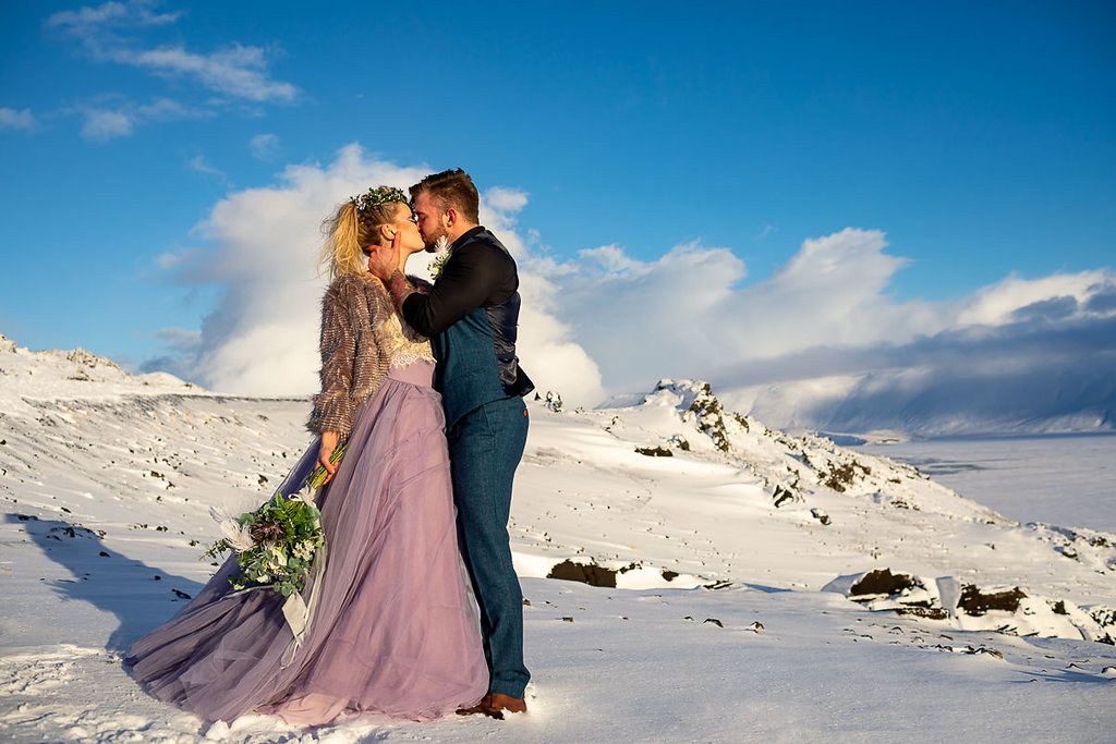 Winter Wedding Wonderland in Iceland with Coloured Bridal Gowns and Regal Headresses