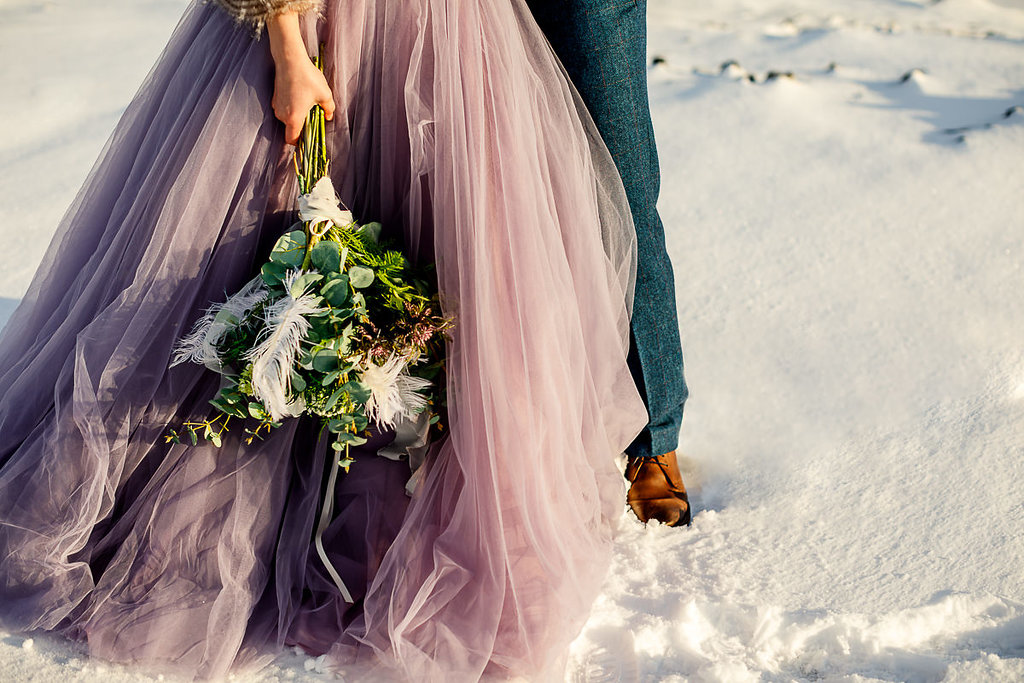 Elopement Winter Wedding in Iceland with Coloured Bridal Gowns and Regal Headresses