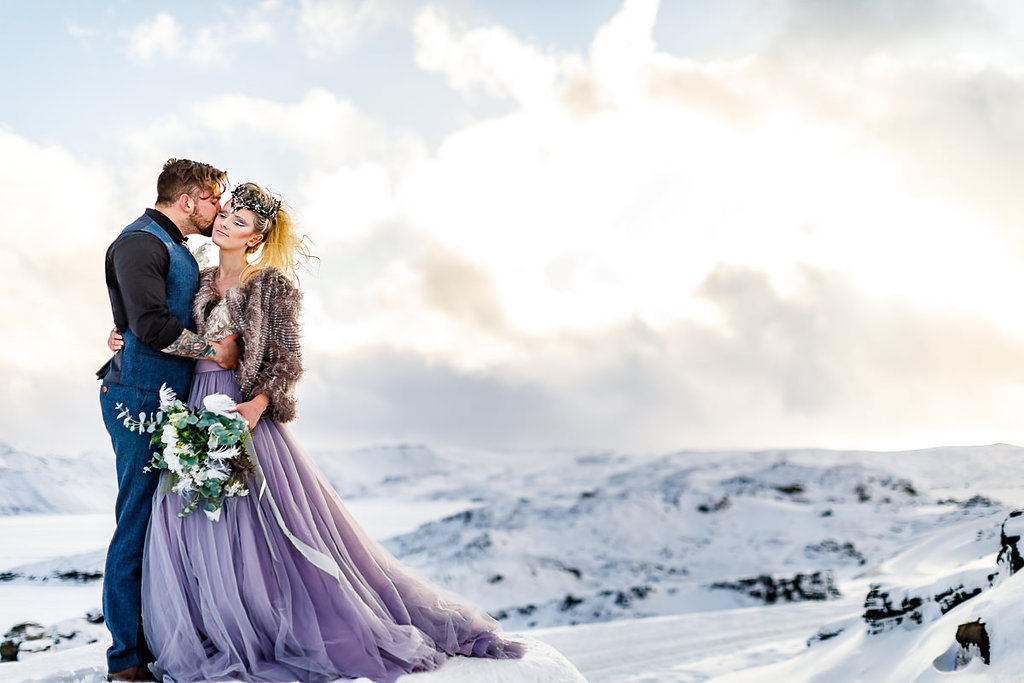 Elopement Winter Wedding in Iceland with Coloured Bridal Gowns and Regal Headresses