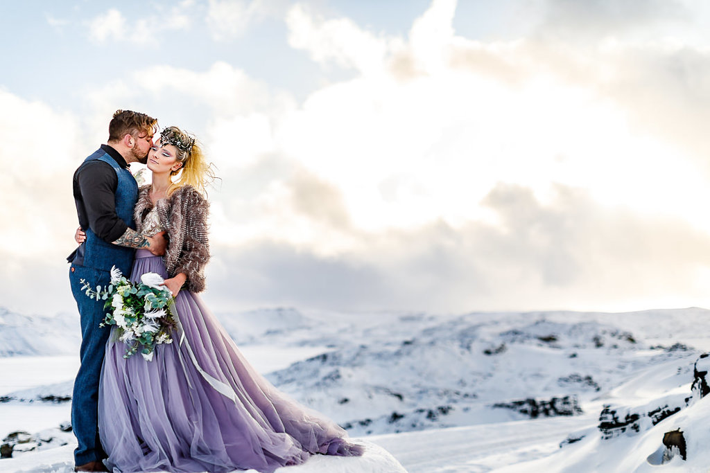 Elopement Winter Wedding in Iceland with Coloured Bridal Gowns and