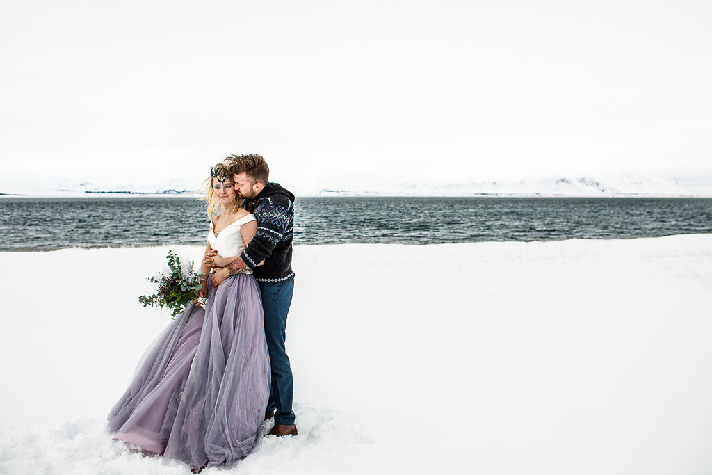 Elopement Winter Wedding in Iceland with Coloured Bridal Gowns and Regal Headresses