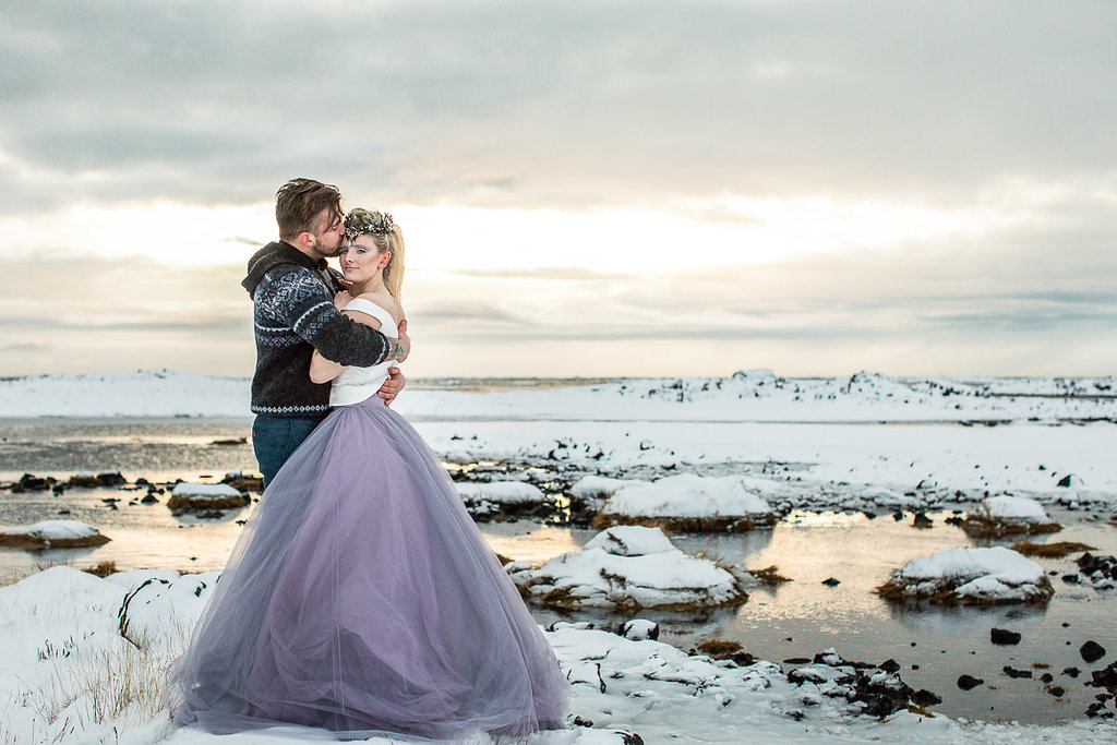 Elopement Winter Wedding in Iceland with Coloured Bridal Gowns and Regal Headresses