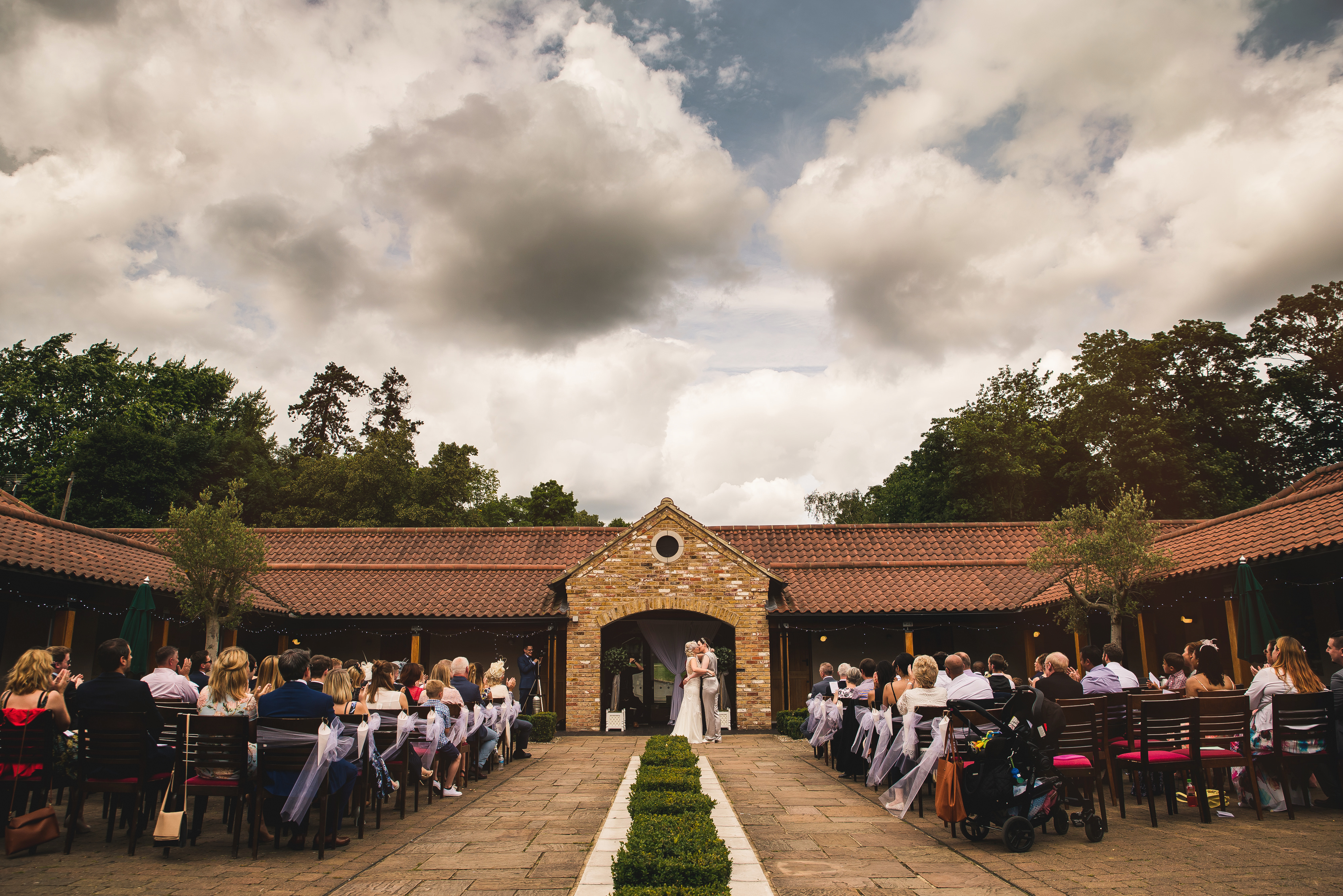 Modern DIY Wedding at Theobolds Estate with A Dress A Jumpsuit and Lots of Personal Touches