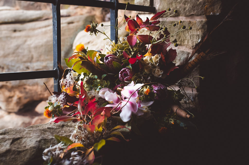 Alternative Winter Wedding Style with Jewelled Cape and Floral Veil