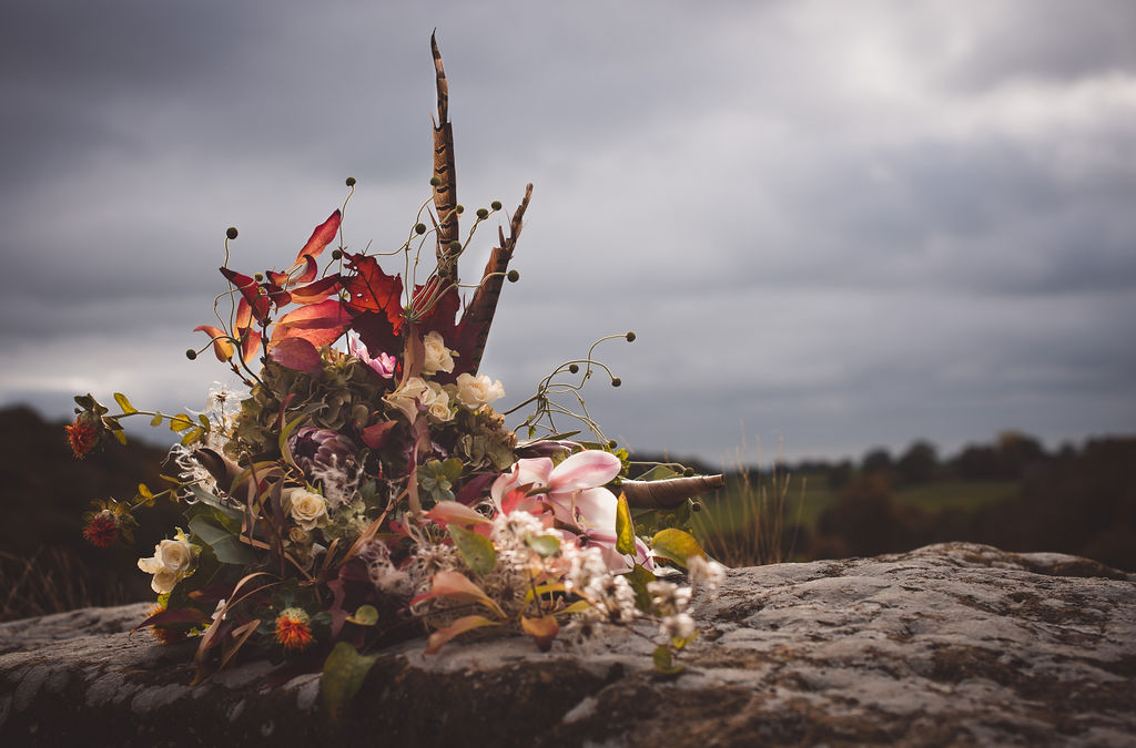 Alternative Winter Wedding Style with Jewelled Cape and Floral Veil