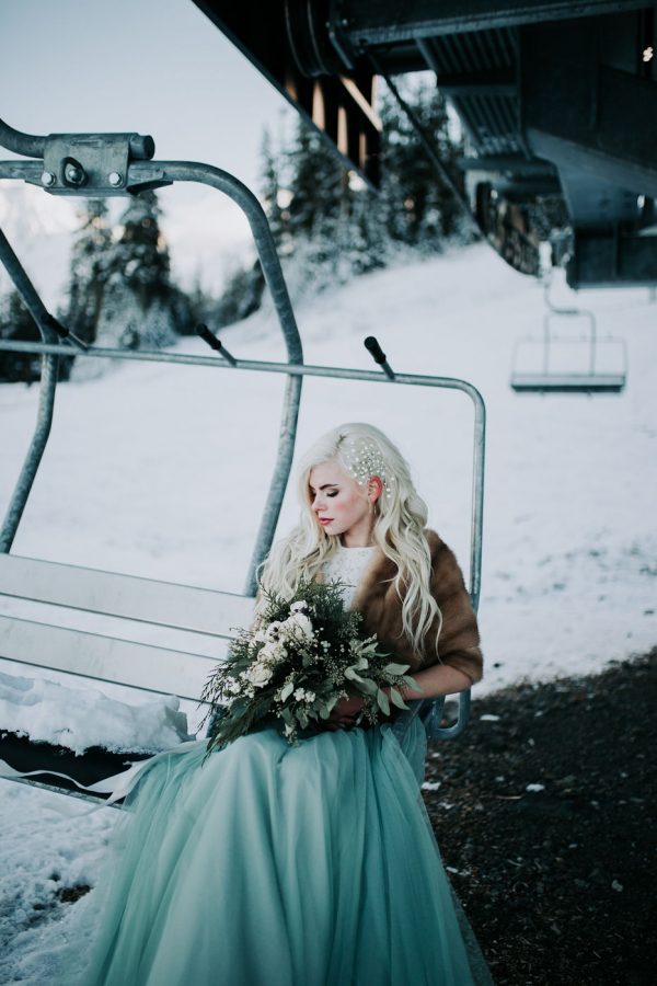 Winter Wonderland Wedding with Blue Wedding Dress and Fur Capelet