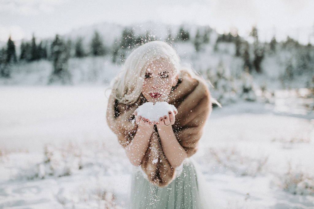 Winter Wonderland Wedding with Blue Wedding Dress and Fur Capelet