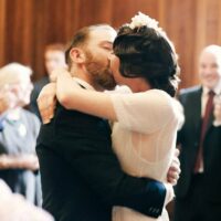 Real Wedding: hackney Town Hall, 1920s vintage ceremony as featured on the National Vintage Wedding Fair photographed by Claire Macintyre