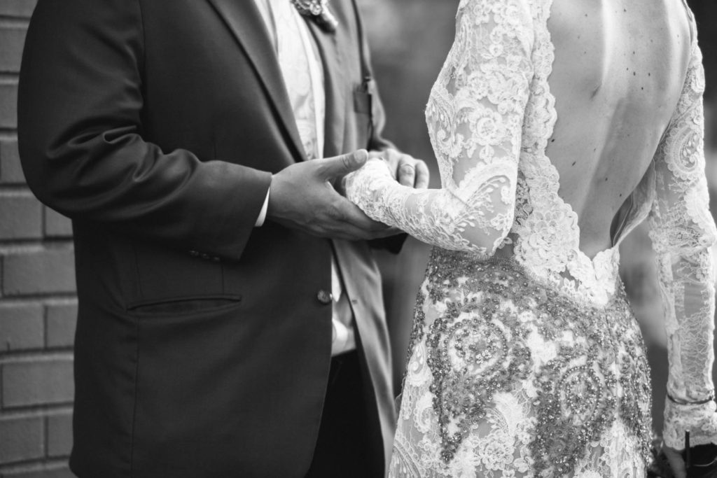 An American wedding with a brooch bouquet and a couture dress