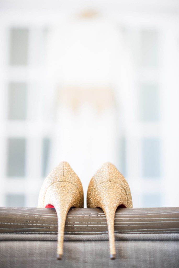 An American wedding with a brooch bouquet and a couture dress