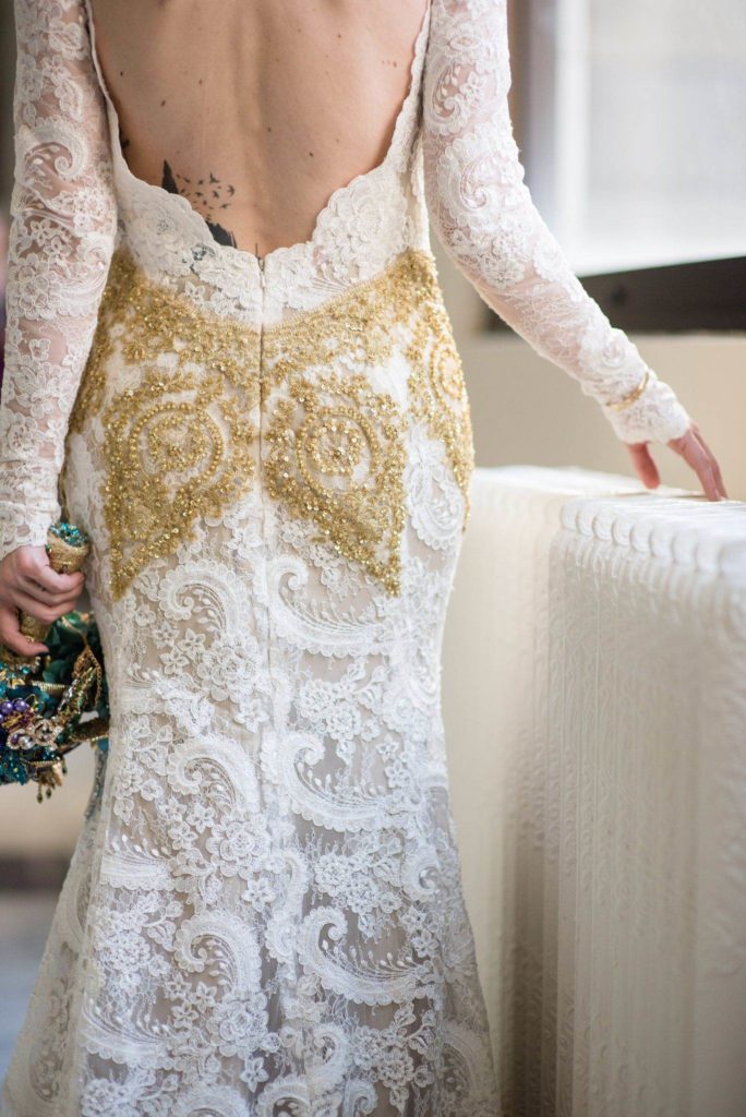 An American wedding with a brooch bouquet and a couture dress