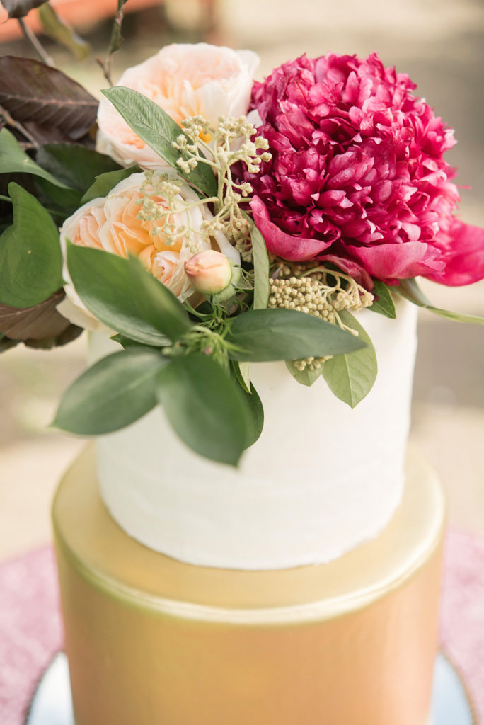 A Pretty Vintage Floral Maximalist Springtime Wedding cake