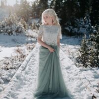 Winter Wonderland Wedding with Blue Wedding Dress and Fur Capelet