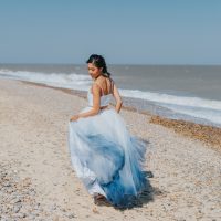 Boho Beach Wedding with Ombre Dress and Blue Wedding Cake