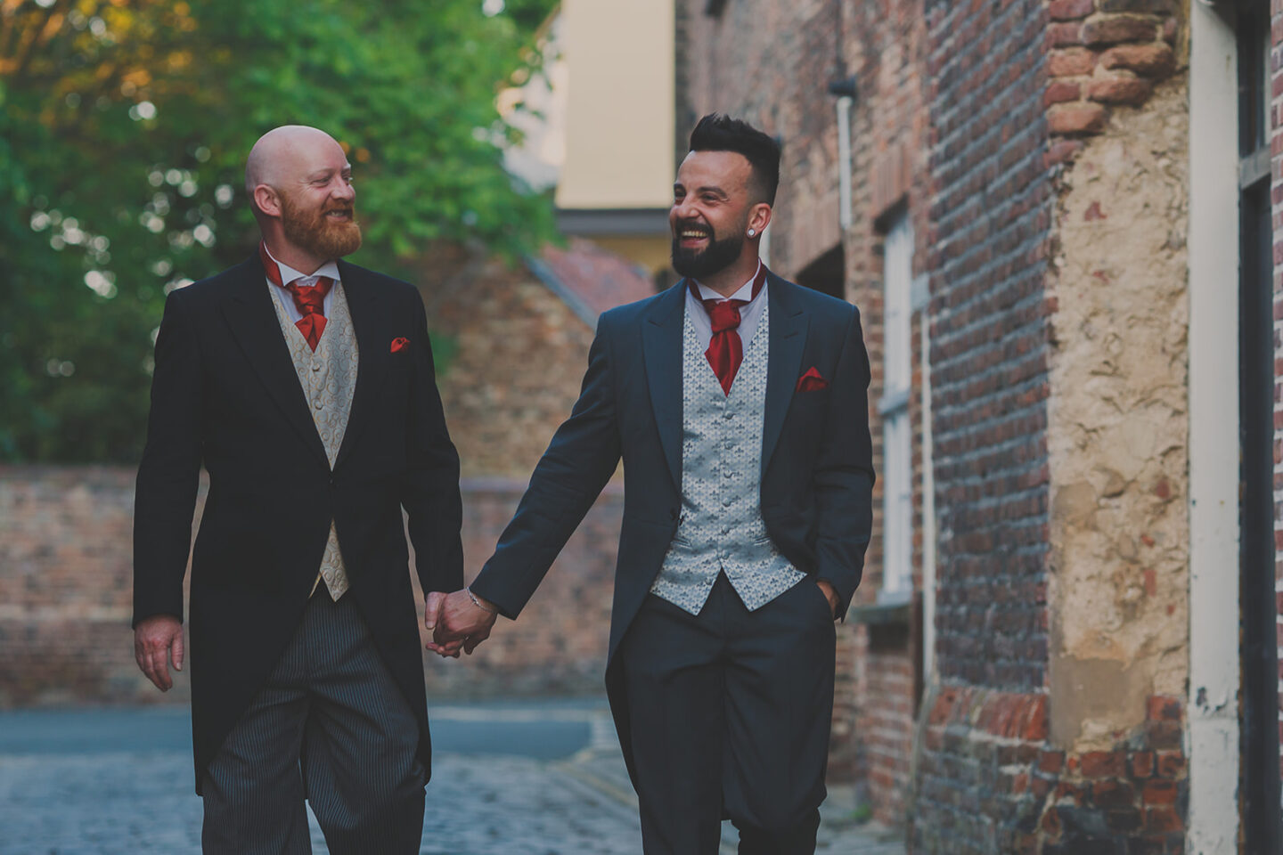 Male couple wearing morning suits