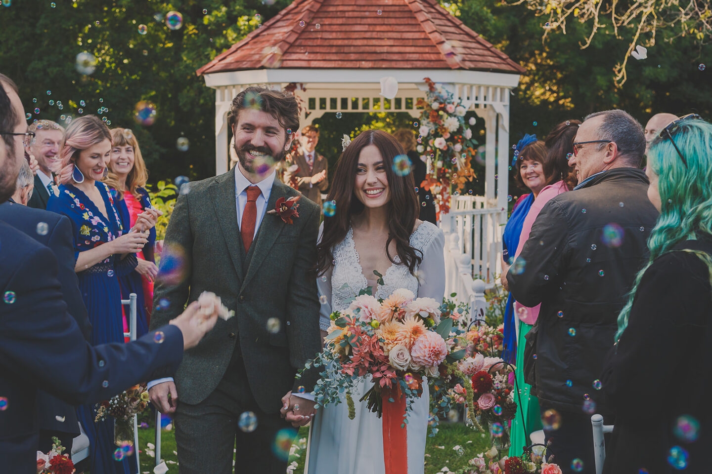 Bridal couple with bubbles